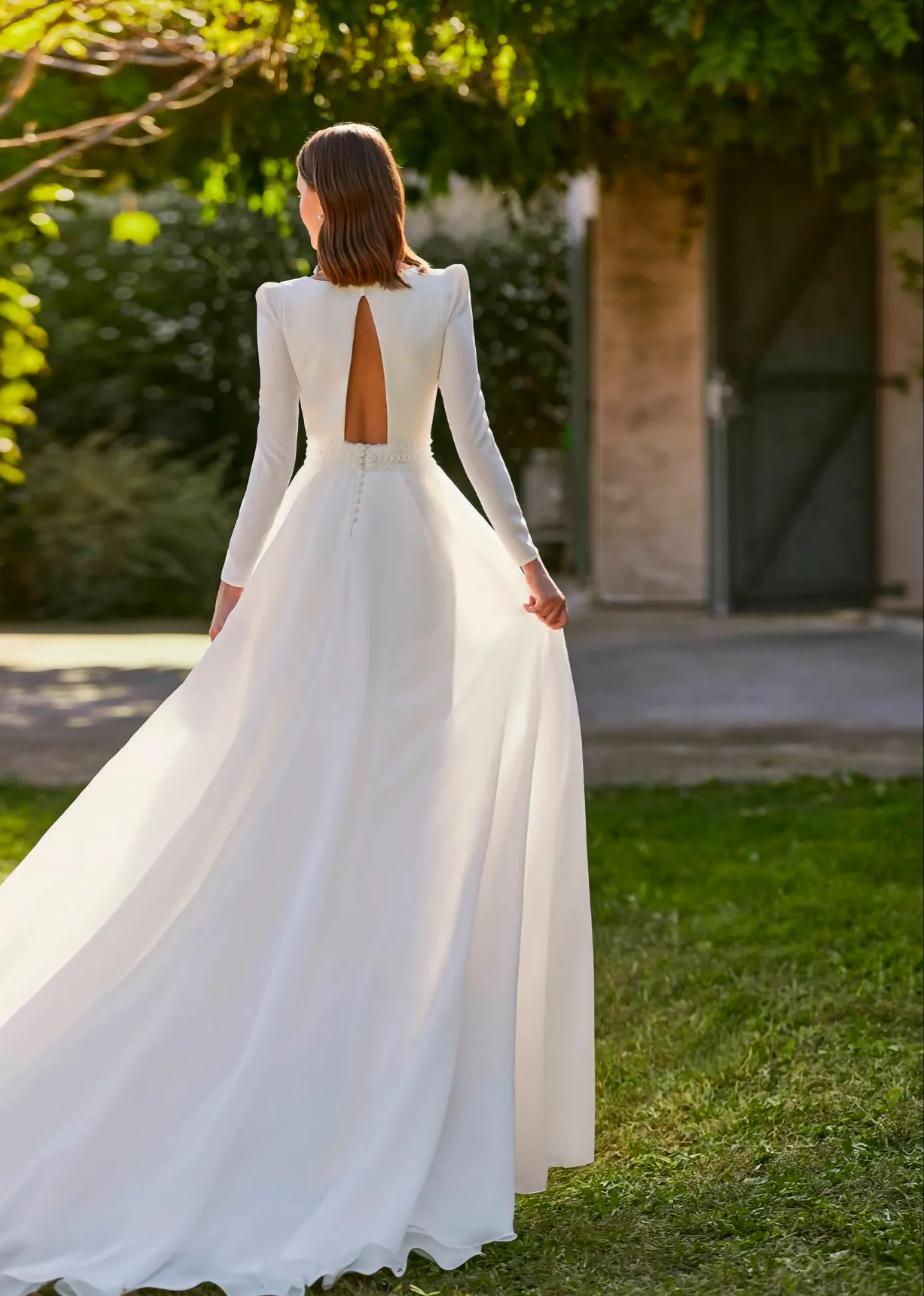 Vestido de novia de manga larga de crepé con abertura en la espalda